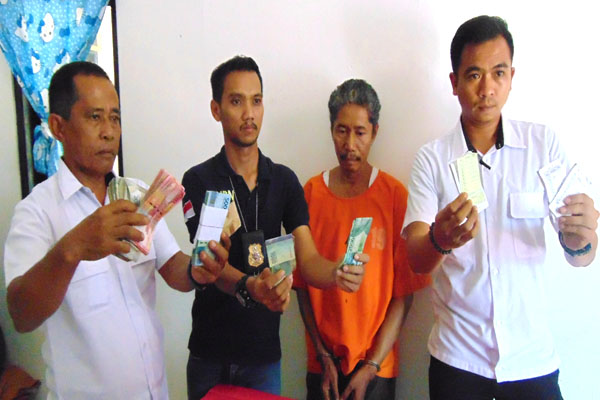 Foto: Tersangka Bandar Togel Diamankan Tim Opsnal Reskrim Polres Kubar / WARTAKUBAR/ HENRY SITUMORANG