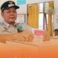 Bupati Mahulu Bonifasius Belawan Geh Melakukan Pencoblosan di TPS 006 Ujoh Bilang