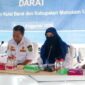 Foto Plt.Kepala Dinas Perhubungan Kutai Barat, Rita Nursandy Saat Menyampaikan Sosialisasi Regulasi Perizinan Angkutan di Pelabuhan Tering.