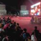 Tampak Ribuan Masyarakat Kutai Barat Tumpah Ruah Memadati Alun-Alun ITHO Saat Menyaksikan Tim Kebanggaan yang Berlaga di Final Pildun 2026.