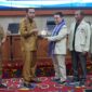 Bupati Kutai Barat, Frederick Edwin Saat Membuka Sosialisasi Program Pendidikan S1, S2, dan S3 yang digelar STIENAS Samarinda.